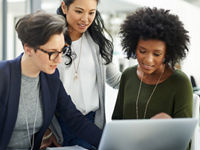 Three business women meeting with a laptop