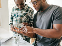 Father talking to his son about money