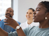 Young female professional leading a brainstorm