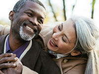Multiethnic senior couple in love taking a selfie