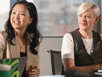 Three Securian Financial associates discussing business plans during a meeting
