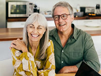 Senior couple talks with financial professional discussing options