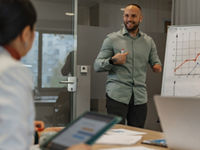 Wounded veteran in the workplace leading a meeting